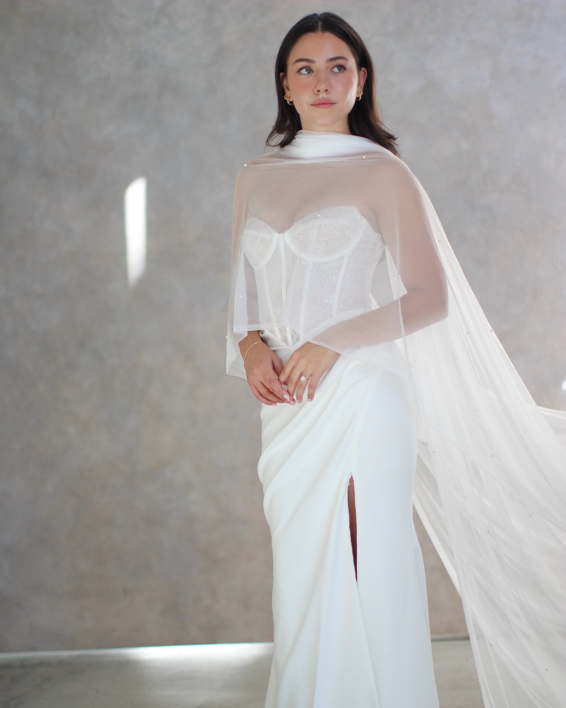 Bridal Neck Scarf with pearls draped over wedding dress